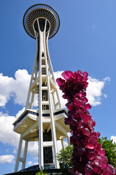 tall purple sculpture and the Seattle Space Needle